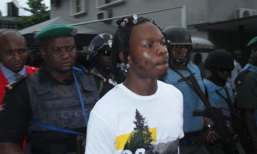 Court strikes out car theft charge against Naira Marley